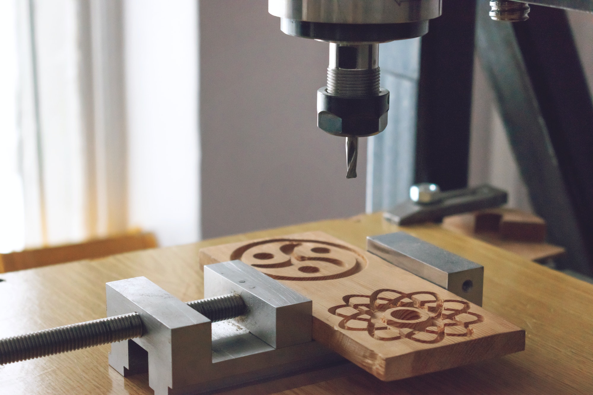 wood cutting machine 3D wood cnc router. CNC milling machine carving a wooden part blank. Cutter